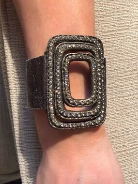 Metallic Silver Leather Statement Bracelet with Decorative Rhinestone Buckle